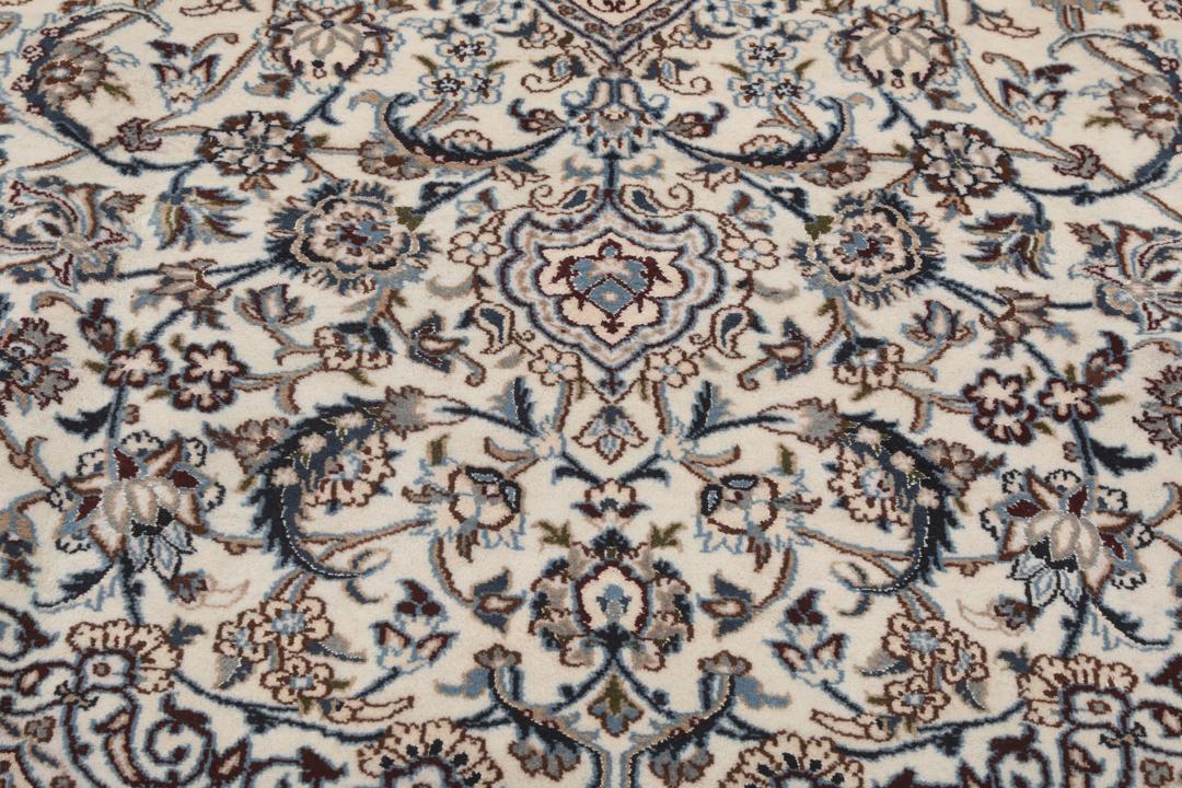 Authentic hand-knotted Nain rug from the Middle East in beige and blue tones