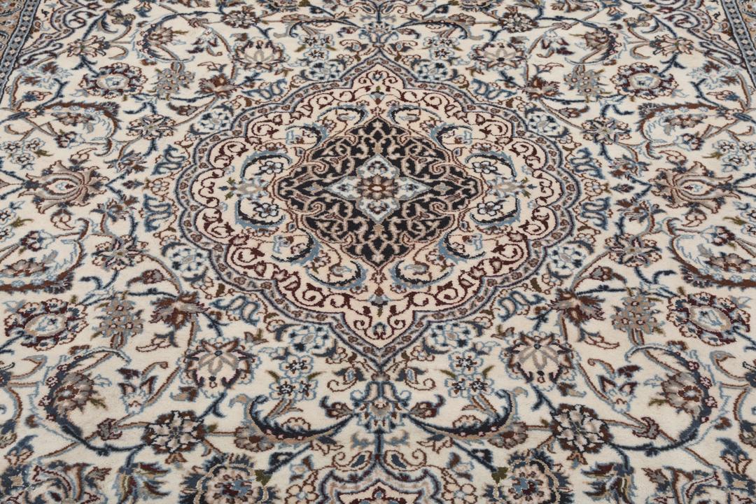 Authentic hand-knotted Nain rug from the Middle East in beige and blue tones