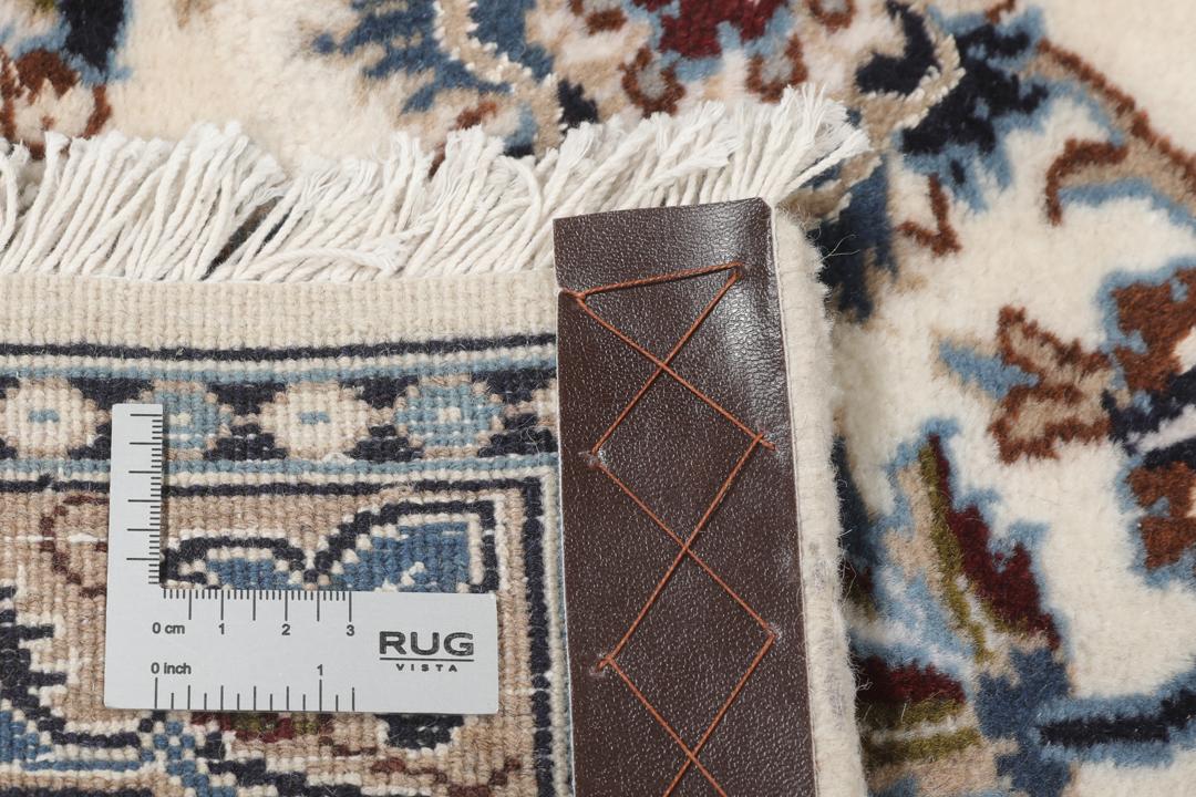 Authentic hand-knotted Nain rug from the Middle East in beige and blue tones