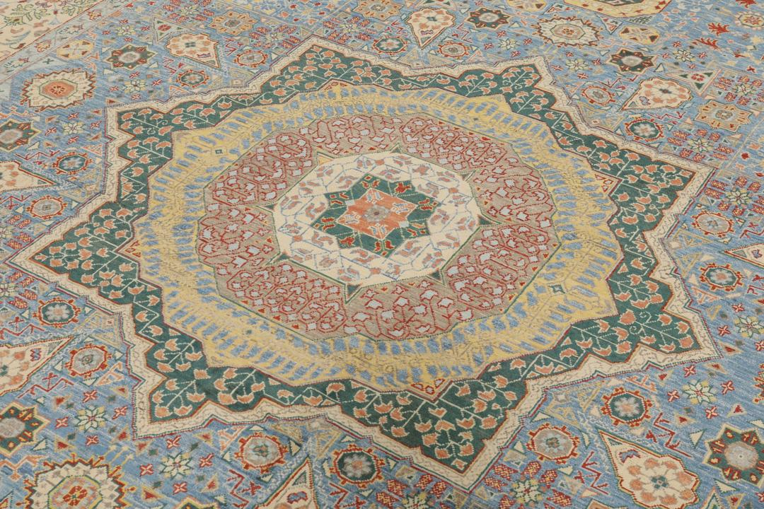 Handgeknoopt Afghaans Mamluk-tapijt in blauw met sierlijke geometrische medaillonpatronen.