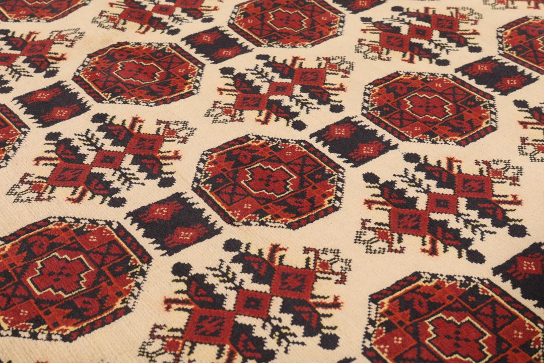 Håndknyttet afghansk Kunduz-tæppe med røde og beige geometriske mønstre