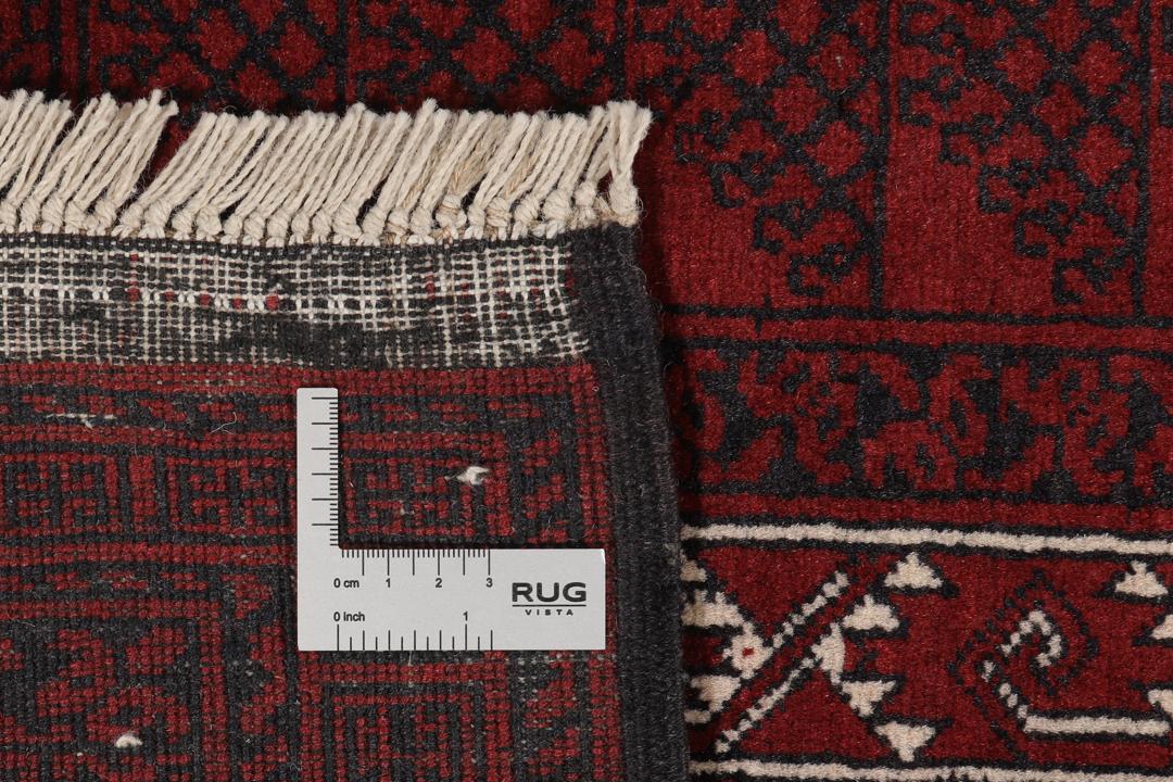 Håndknyttet afghansk Kunduz-tæppe i dyb rød med geometriske mønstre