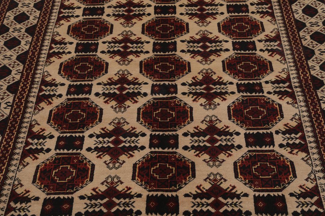 Tapis Kunduz noué à la main originaire d'Afghanistan dans des tons rouge et beige