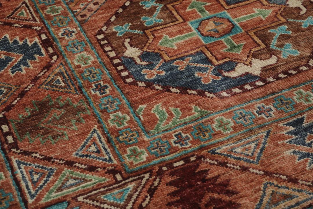 Handgeknoopte Afghaanse loper in rood met geometrische motieven