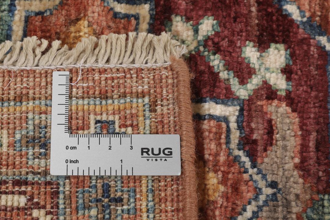 Handgeknoopte Afghaanse loper met rode tinten en geometrische medaillons