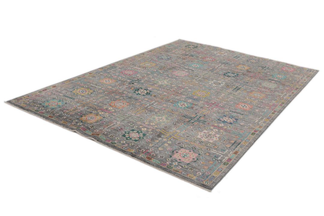 Alfombra de lana afgana anudada a mano en gris con vibrantes patrones geométricos