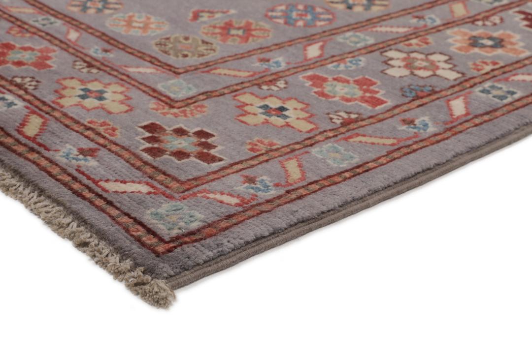 Hand-knotted Afghan Kazak rug with a grey field and geometric medallion motifs.