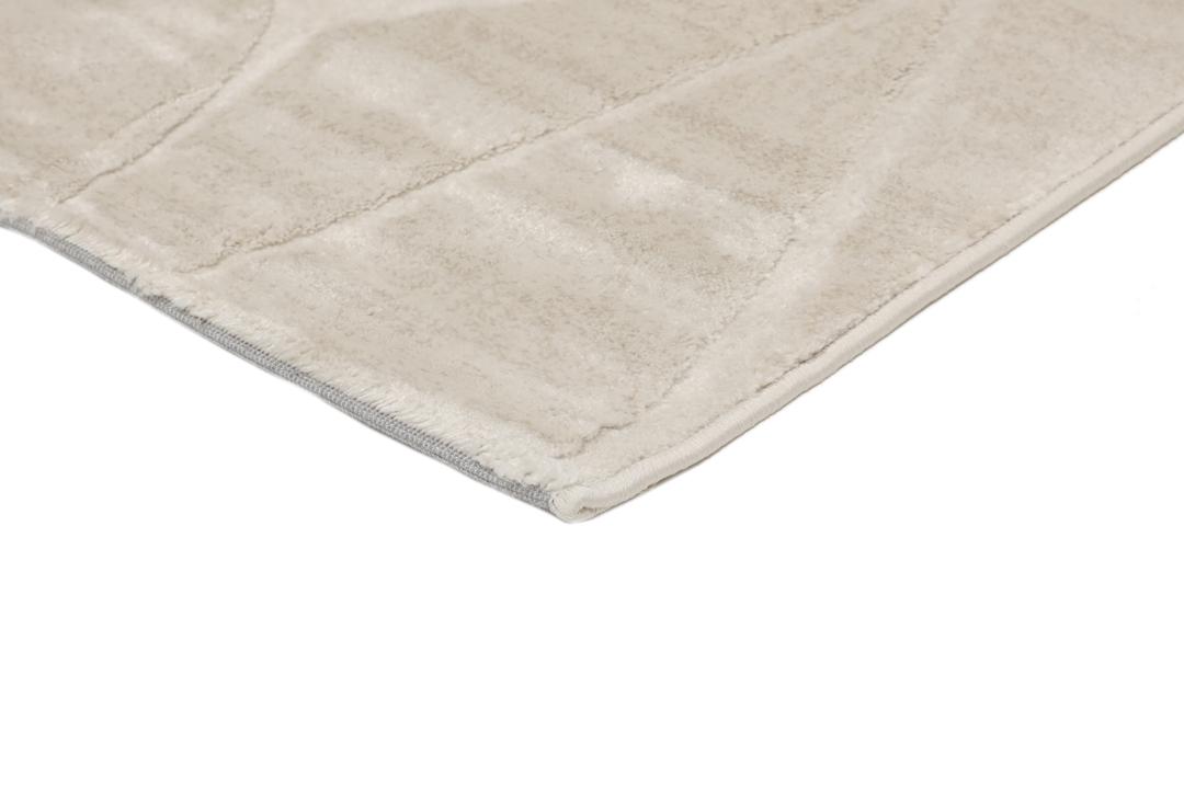 Modern geometric rug in beige tones