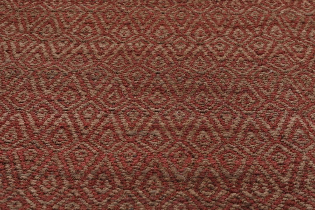 Handgeweven Indiaas tapijt in rood met geometrische textuur