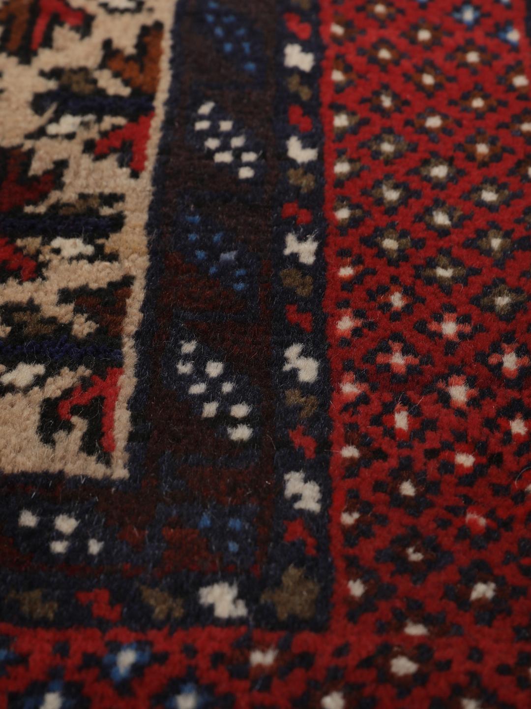 Handgeknoopt Beluch-tapijt met rode en zwarte geometrische patronen uit het Midden-Oosten