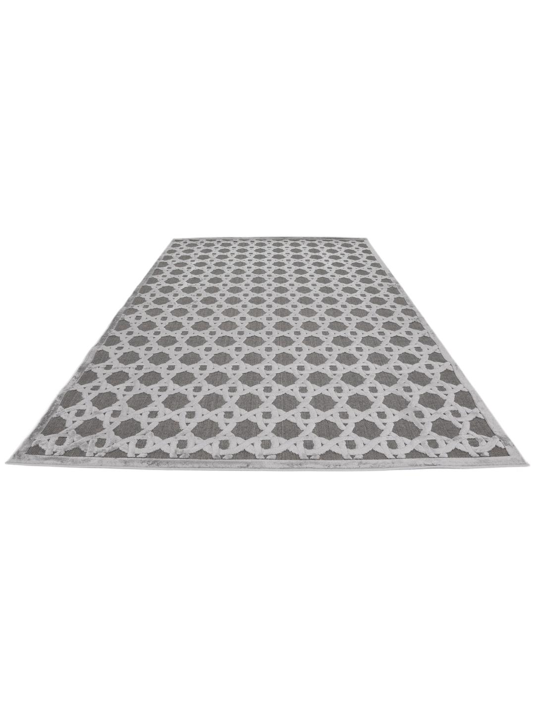 Grijs tapijt met een gestructureerd hoog en laag poolpatroon