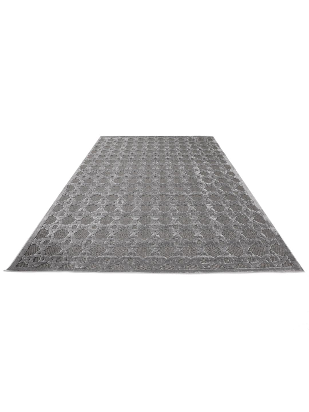 Grijs tapijt met een gestructureerd hoog en laag poolpatroon