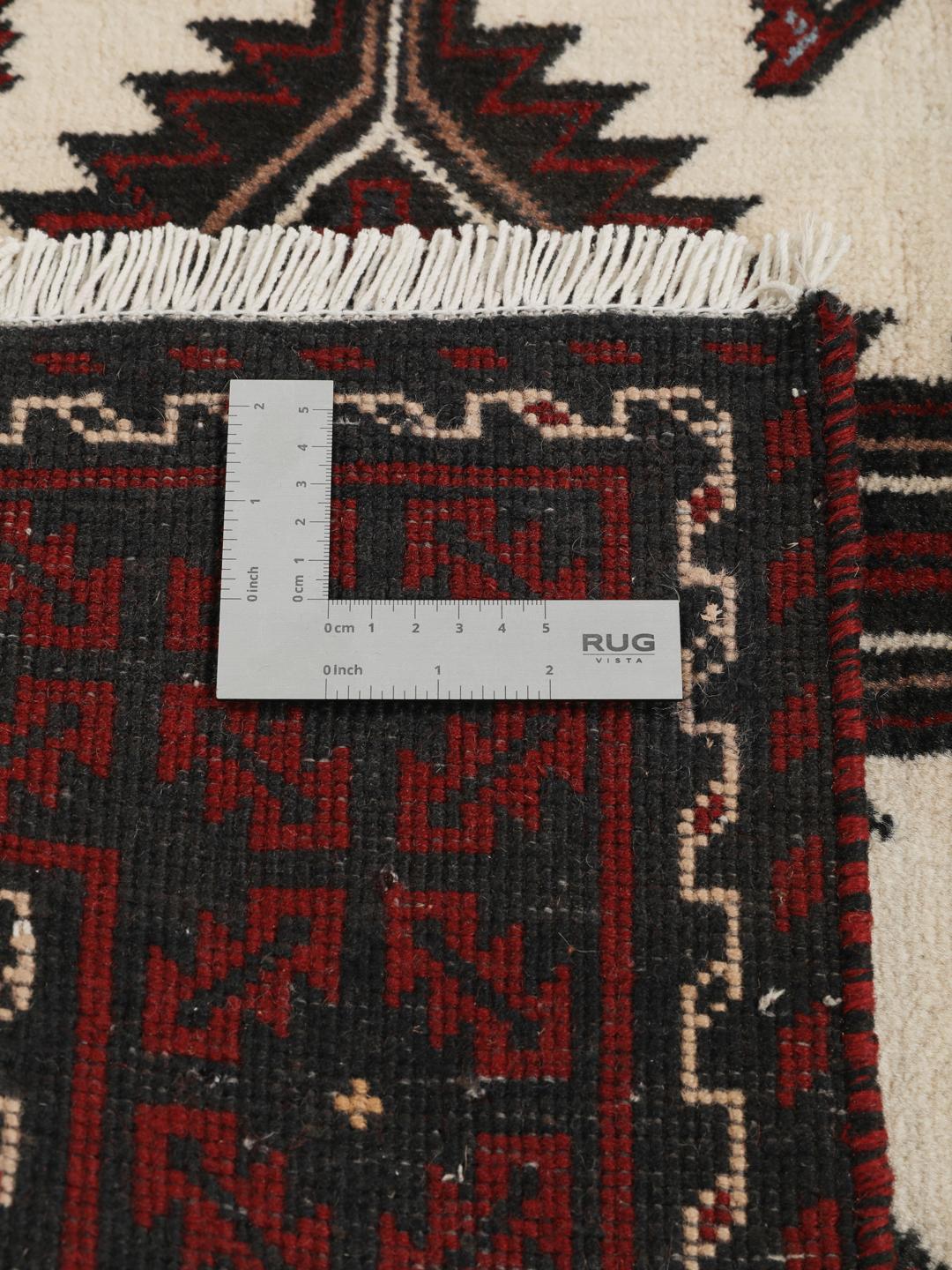 Handgeknoopt Beluch-tapijt met tribale geometrische motieven in donkerrood en beige
