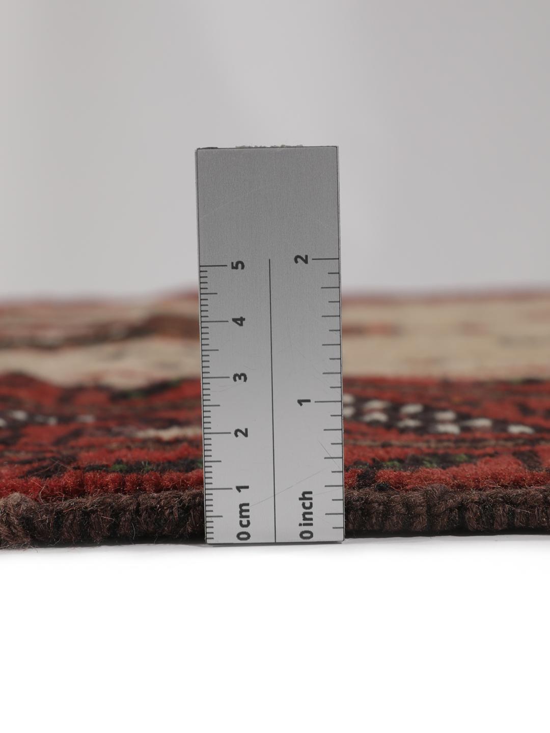 Håndknyttet Baluch-tæppe fra Mellemøsten i røde og beige nuancer