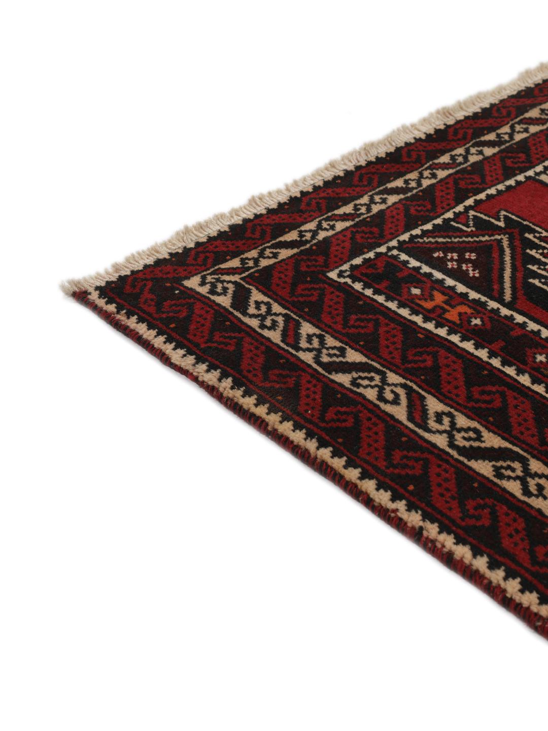 Hand-knotted Middle Eastern Baluch rug in dark red with geometric patterns