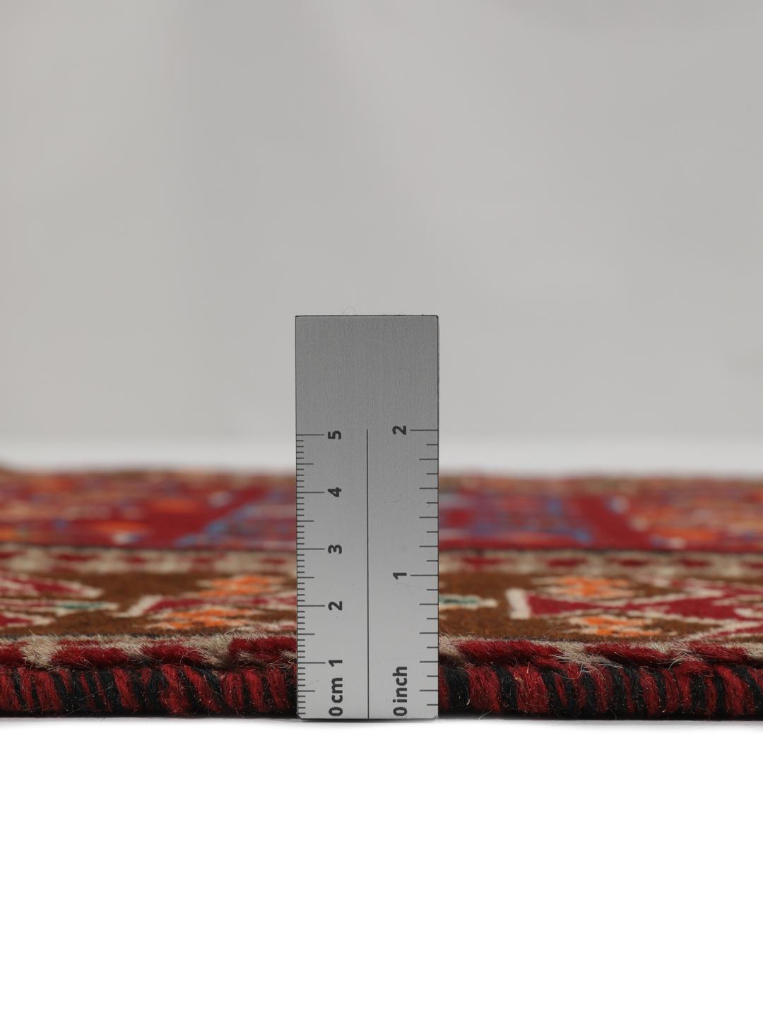 Håndknyttet Beluch-tæppe med rødt felt og geometriske stammemønstre