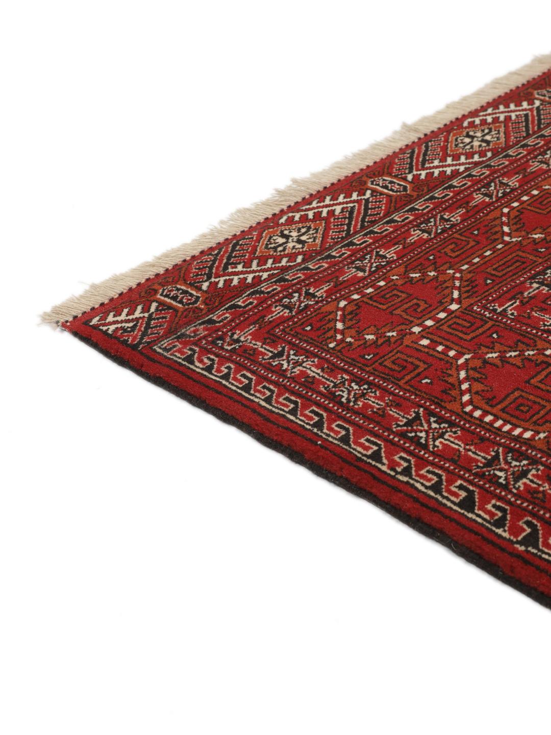 Handgeknoopt Turkaman-tapijt uit het Midden-Oosten in rood en crème