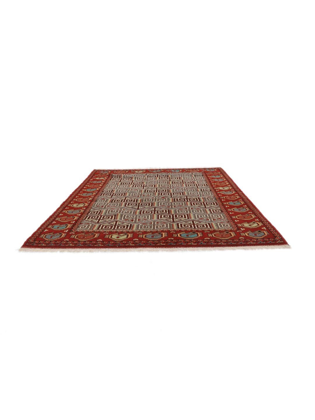 Tapis Turkaman noué à la main originaire du Moyen-Orient en rouge avec des motifs géométriques