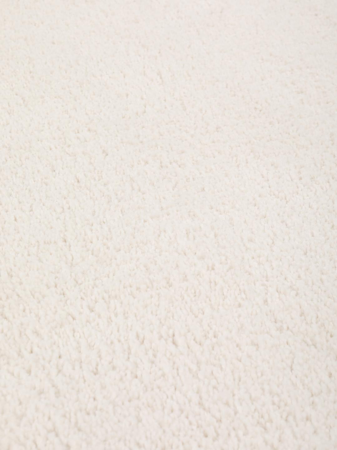 Tapis rond de couleur blanc cassé
