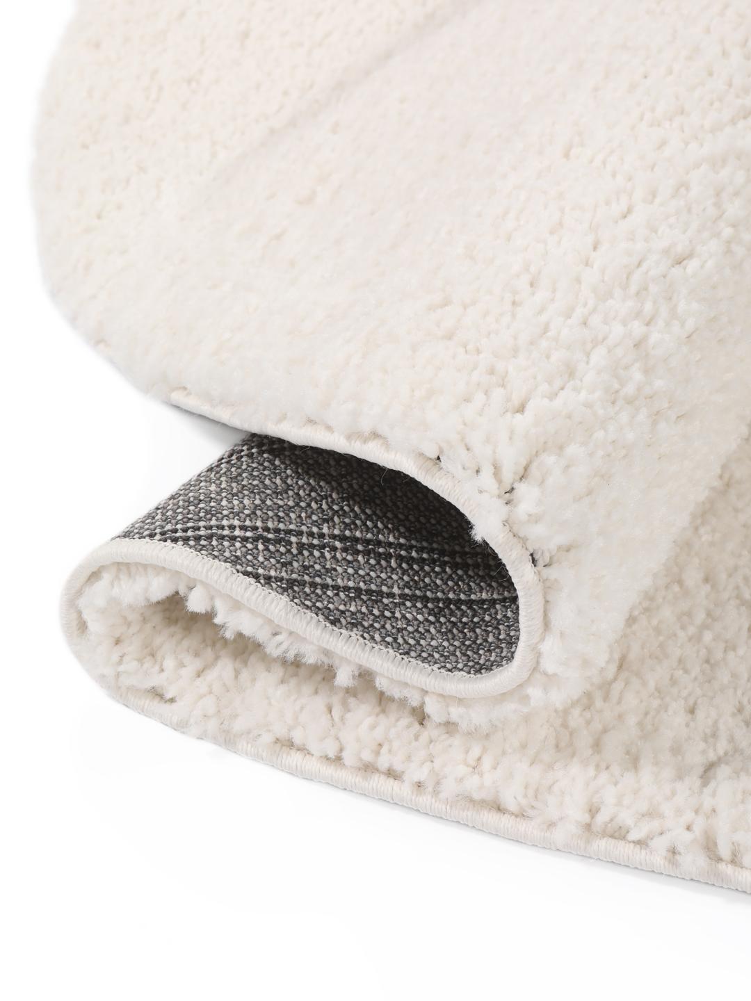 Tapis rond de couleur blanc cassé