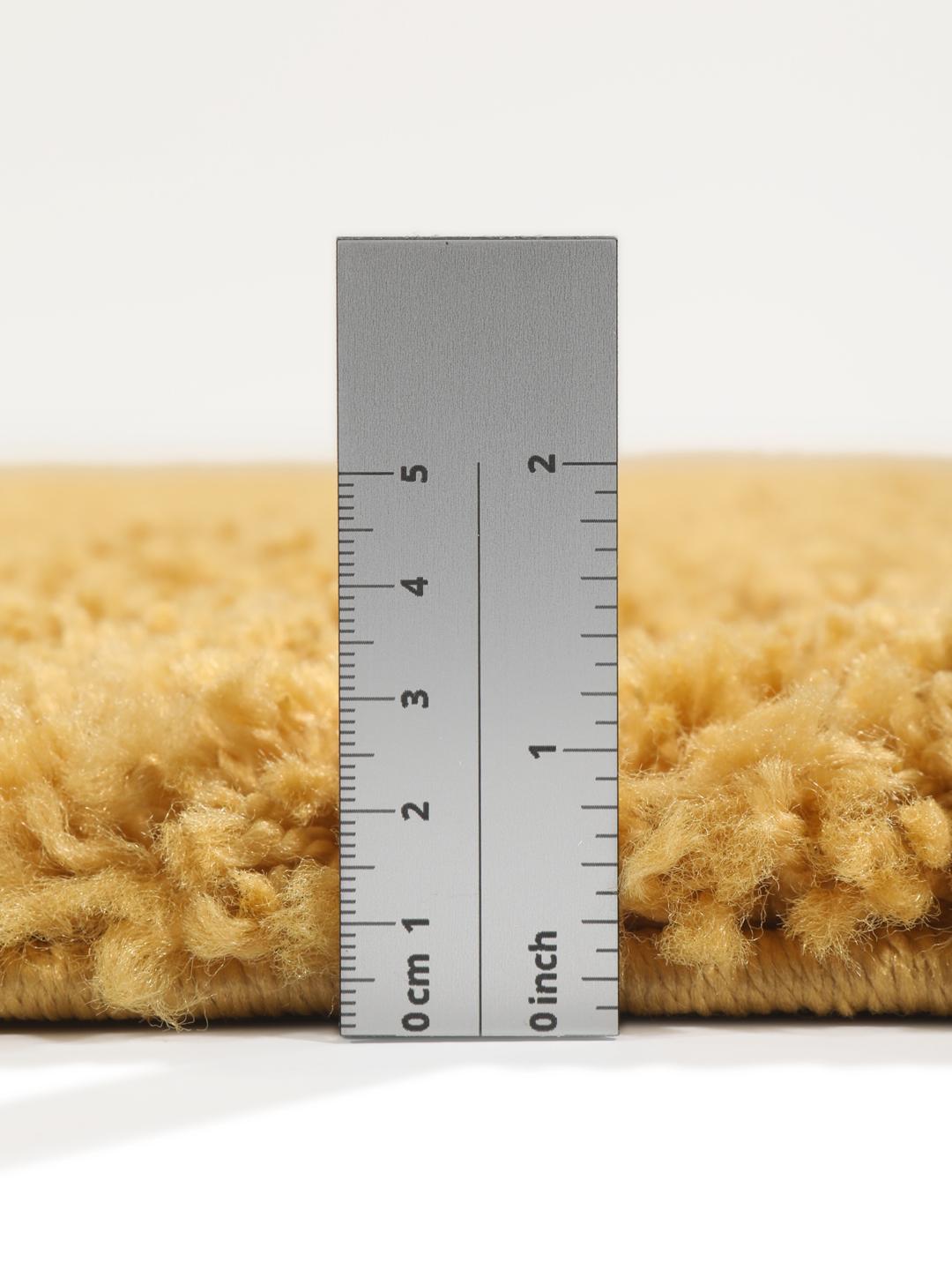 Rond geel vloerkleed