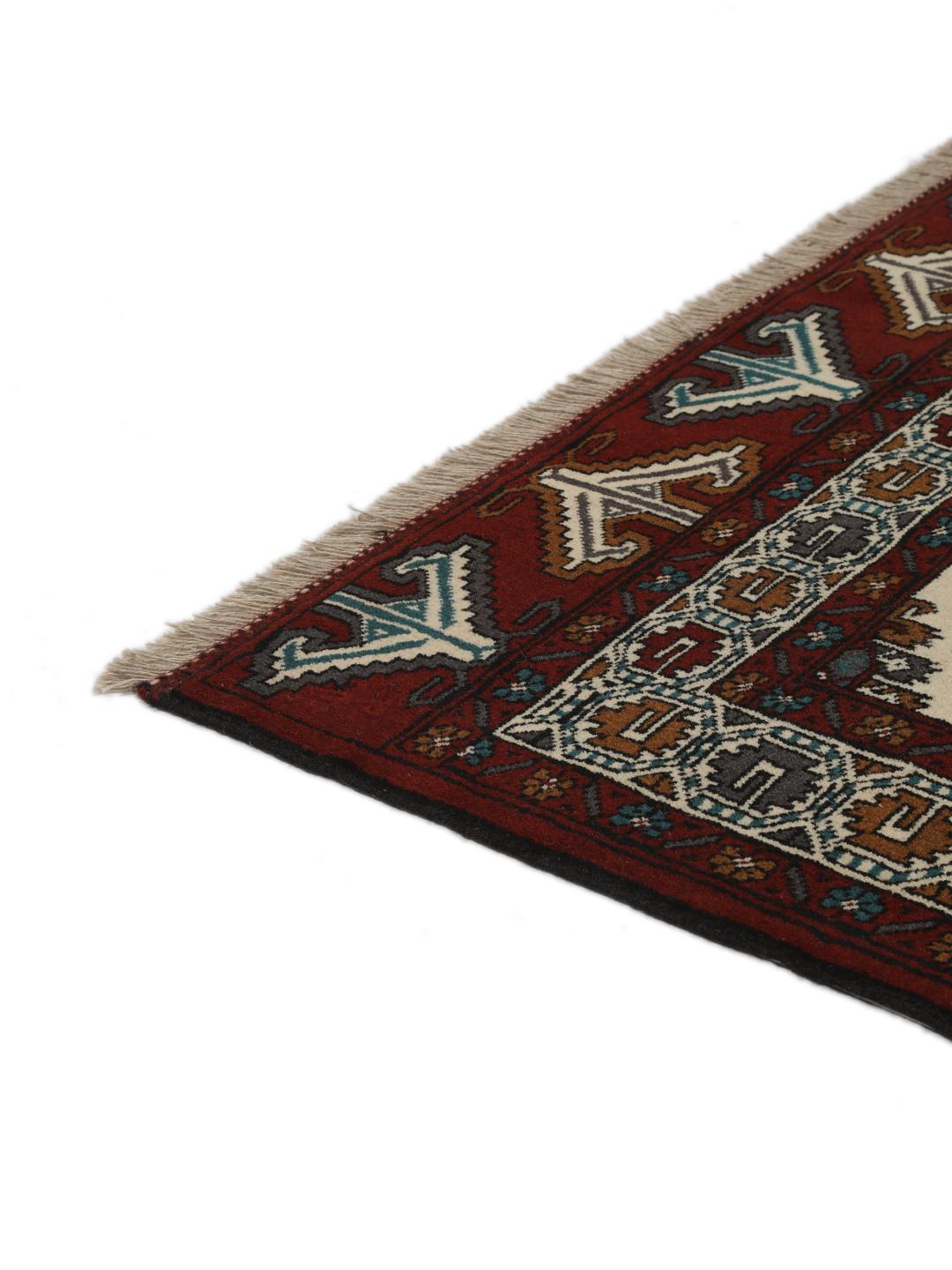 Hand-knotted Middle Eastern Turkaman wool rug in red and beige