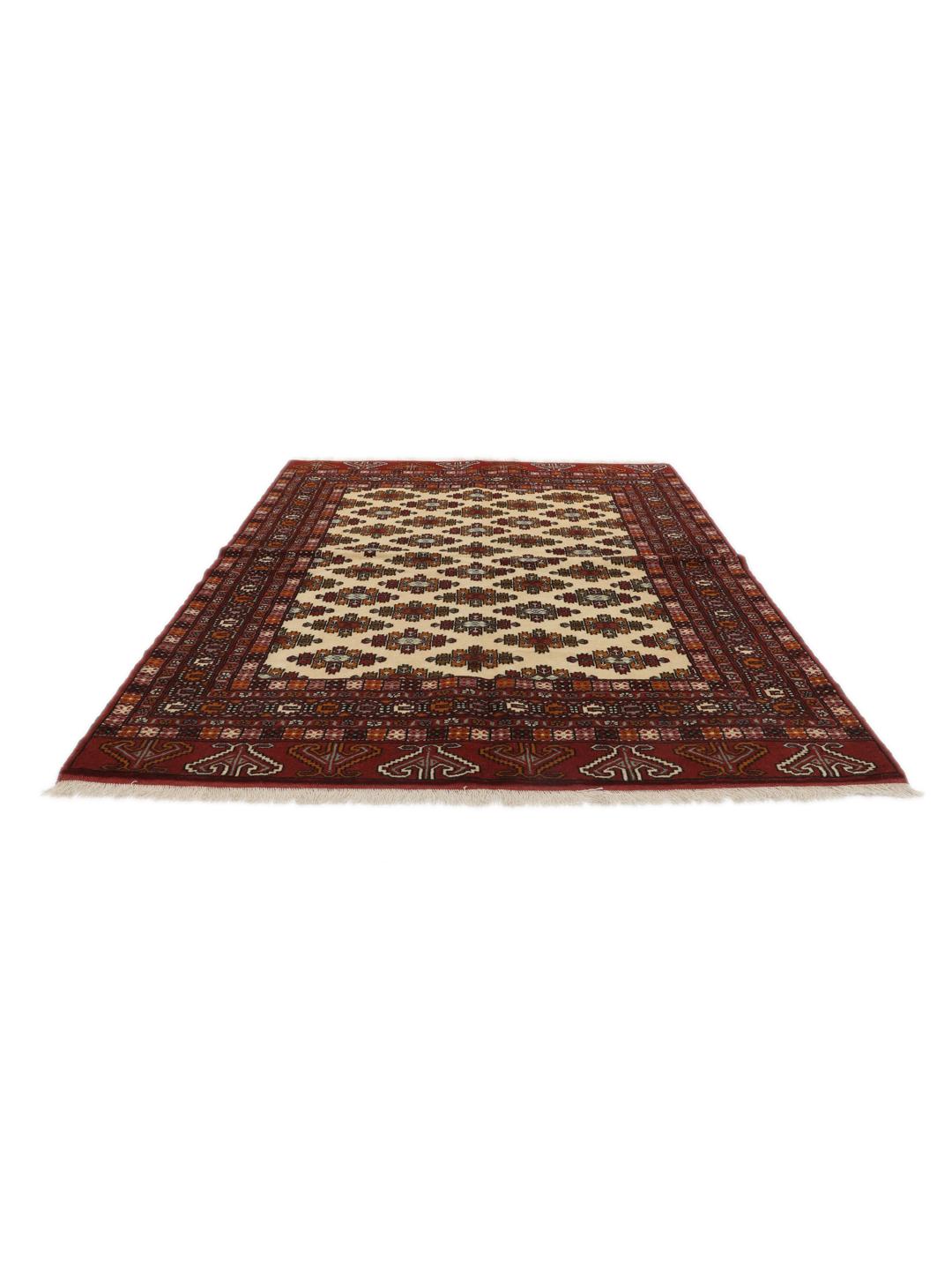Hand-knotted Turkaman Wool rug from the Middle East in deep red and beige tones