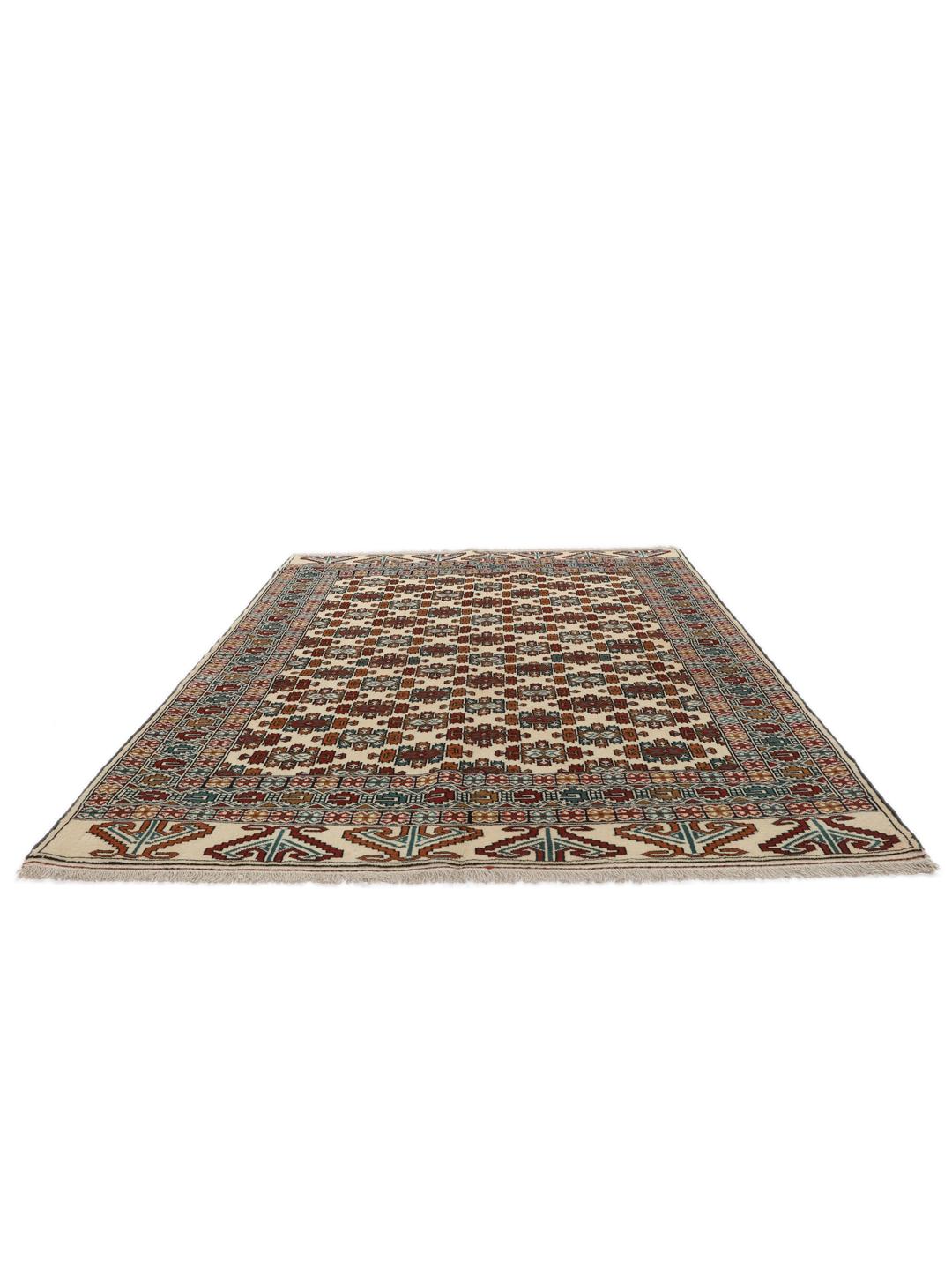 Hand-knotted Turkaman rug from the Middle East in beige with repeating geometric motifs