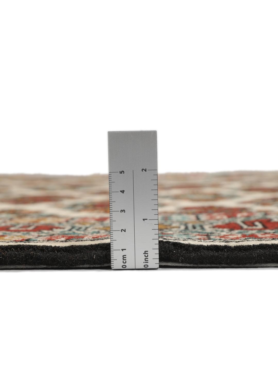 Hand-knotted Turkaman rug from the Middle East in beige with repeating geometric motifs