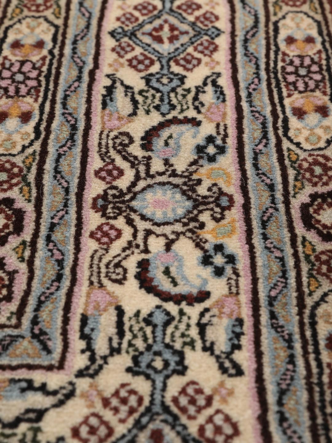Hand-knotted Moud rug with intricate patterns in multicolor Wool, origin Middle East.