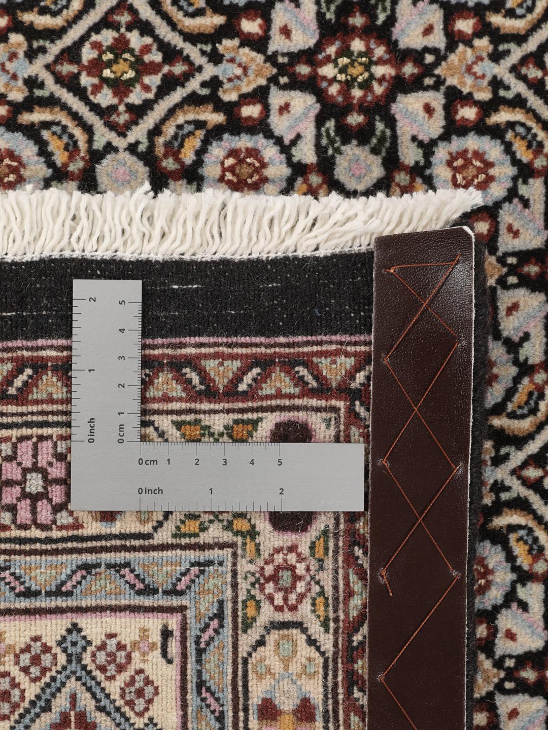 Hand-knotted Moud rug with intricate patterns in multicolor Wool, origin Middle East.