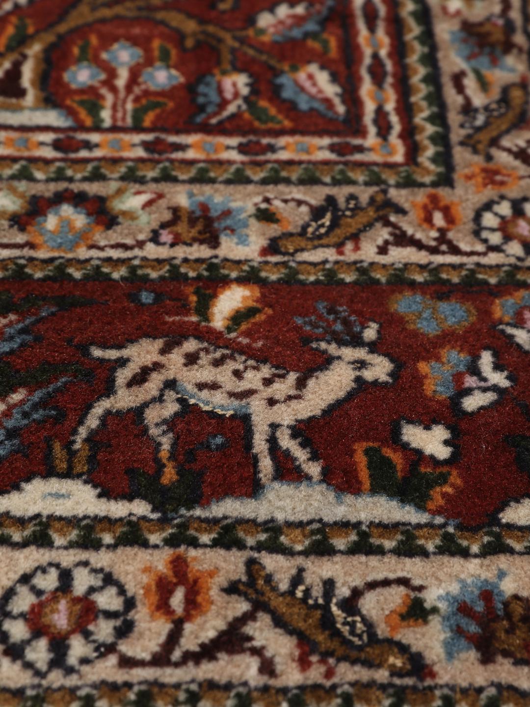 Hand-knotted Moud rug from the Middle East in dark-red and multicolour