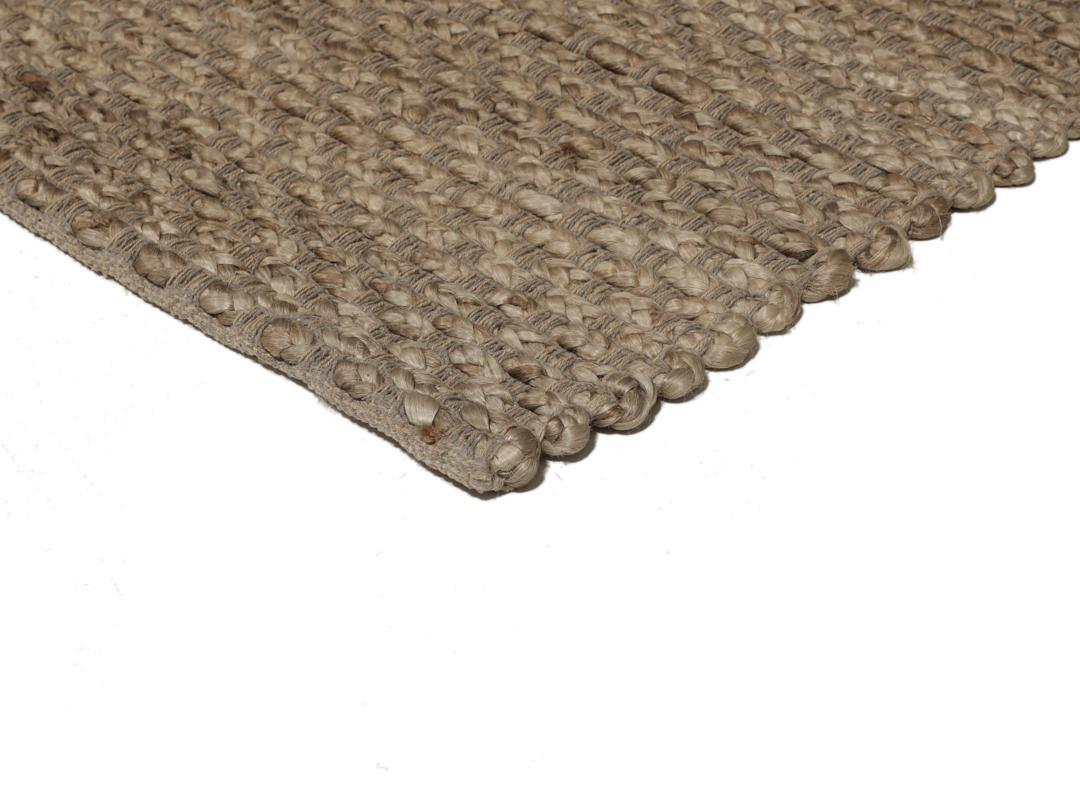 Handgeweven jute tapijt uit India in een natuurlijke beige tint