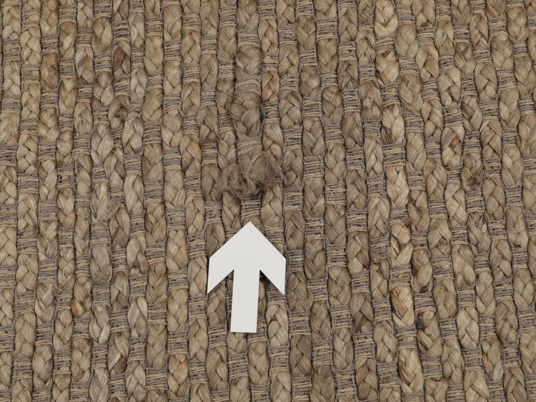 Handgeweven jute tapijt uit India in een natuurlijke beige tint