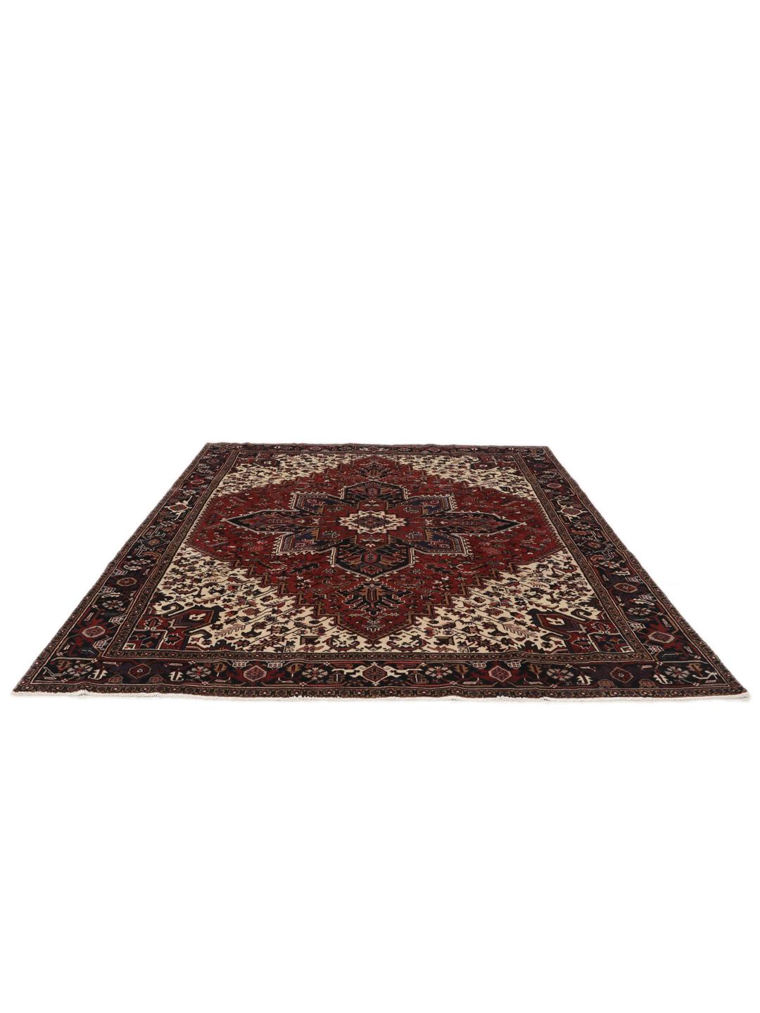 Hand-knotted Heriz rug from the Middle East in red and blue tones
