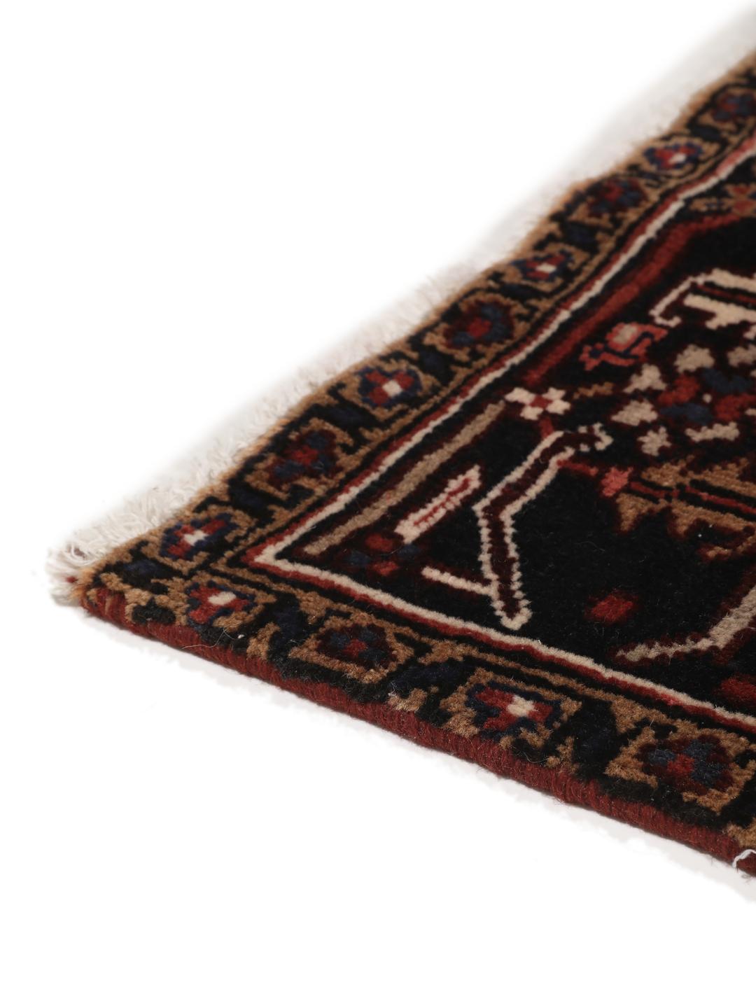 Hand-knotted Heriz rug from the Middle East in red and blue tones