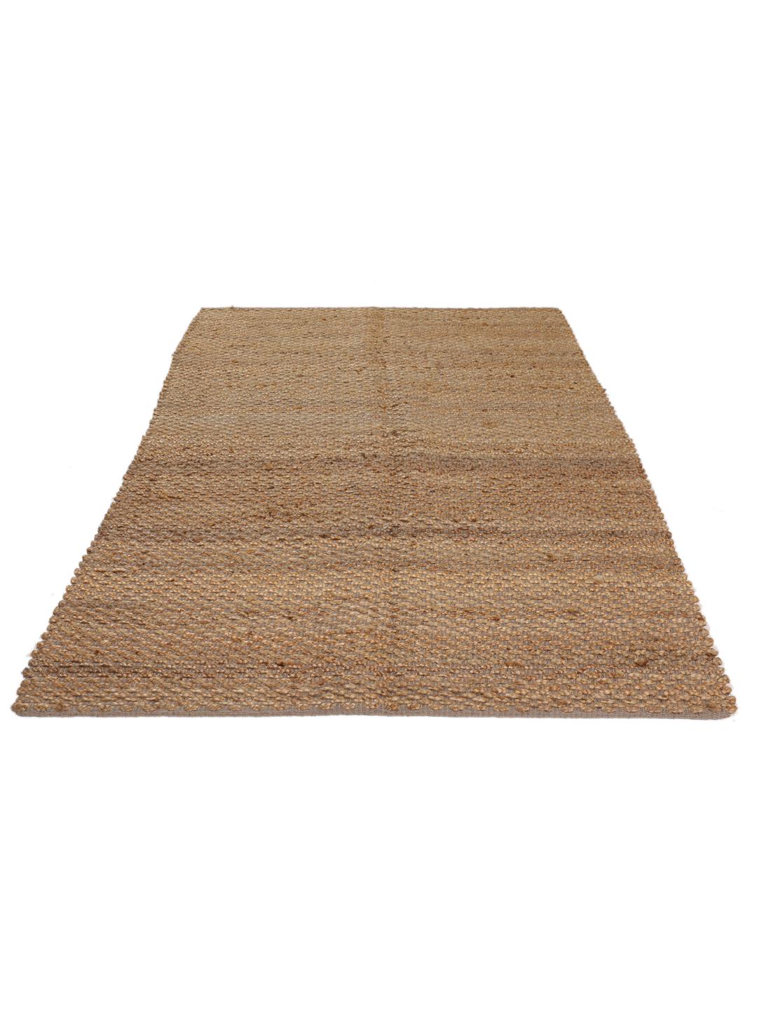 Handgeweven jute vloerkleed uit India in een natuurlijke beige kleur