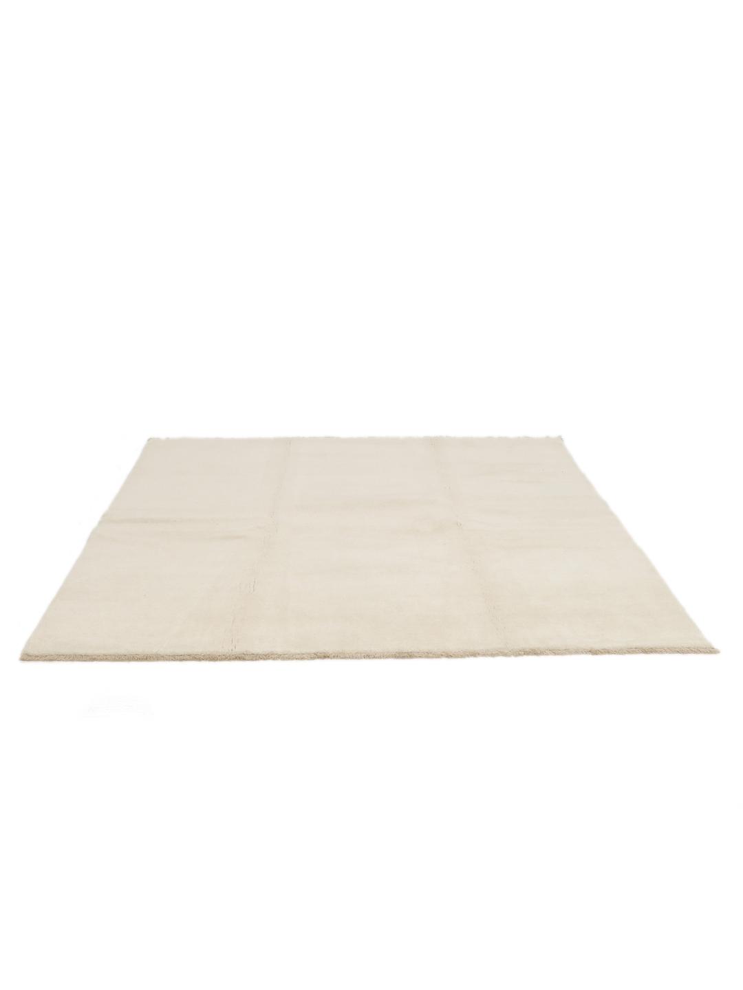 Vierkant beige vloerkleed met franjes