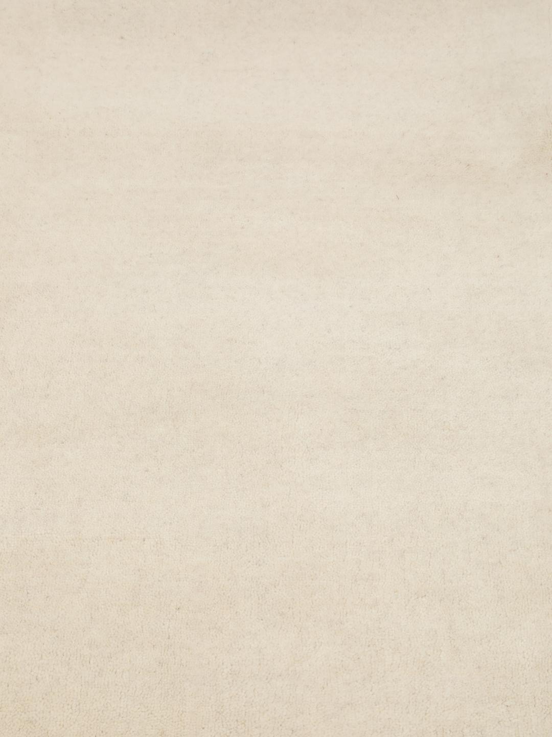 Vierkant beige vloerkleed met franjes