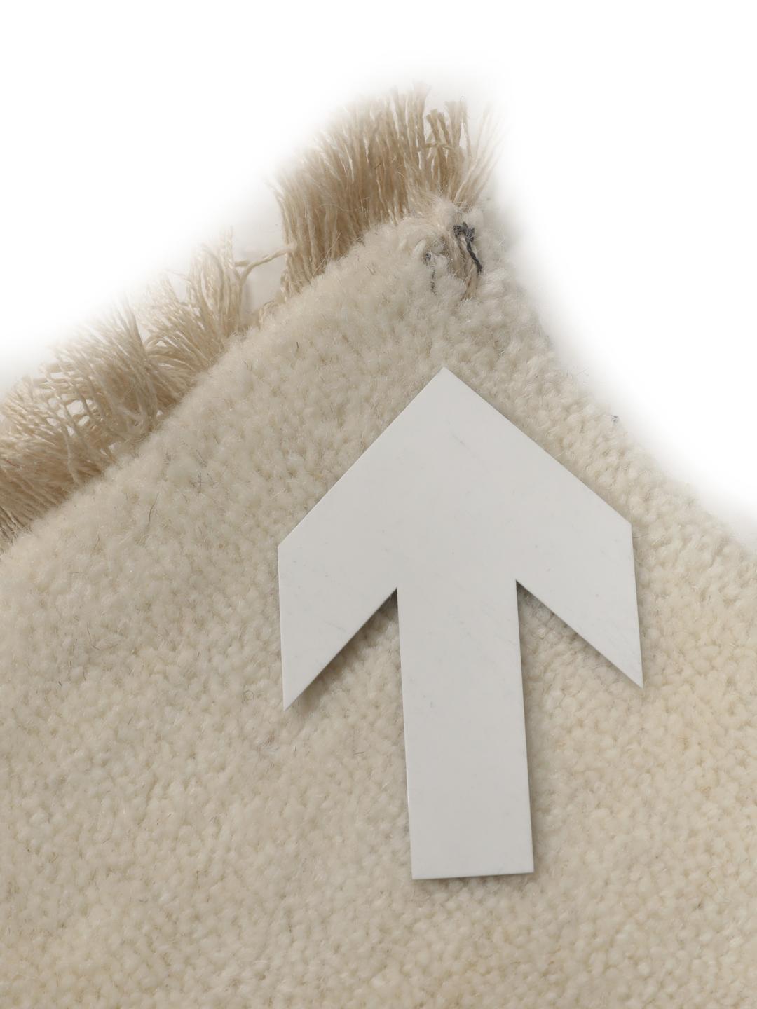 Vierkant beige vloerkleed met franjes