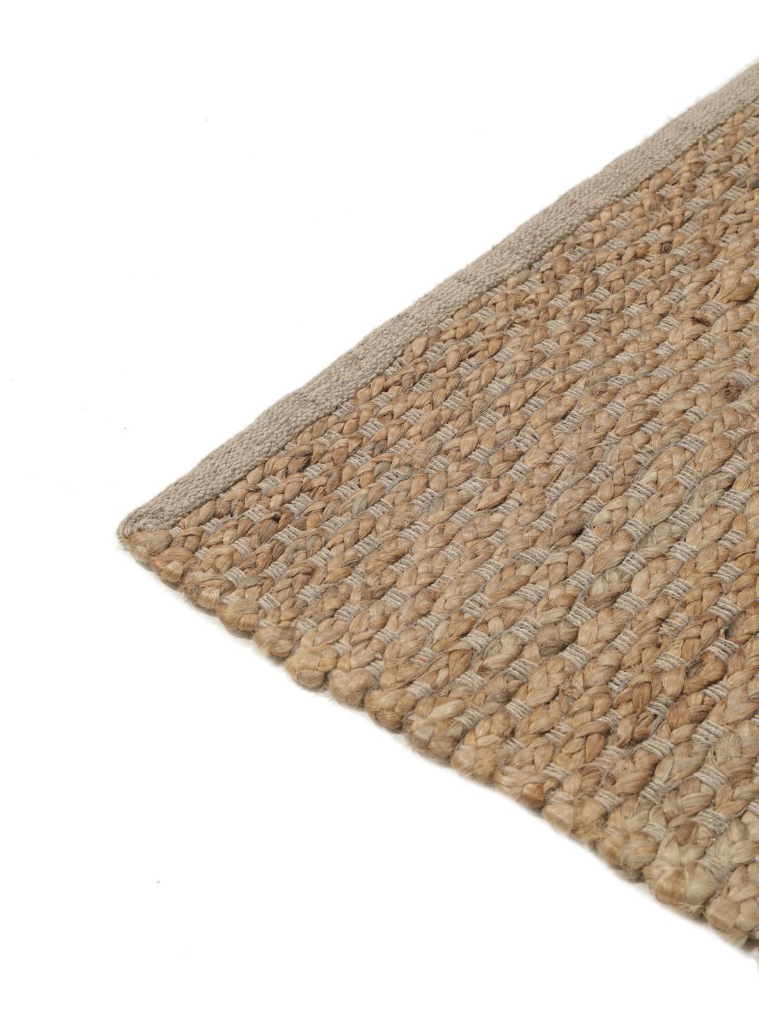 Håndvevd juteteppe fra India i en naturlig beige farge