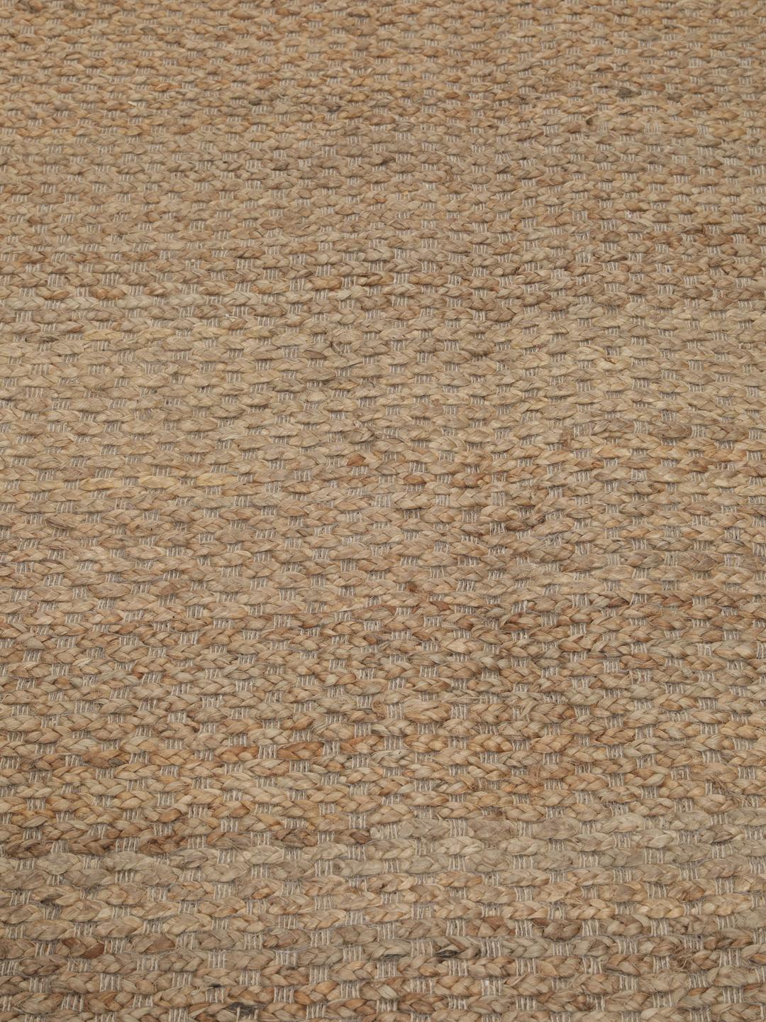 Håndvevd juteteppe fra India i en naturlig beige farge