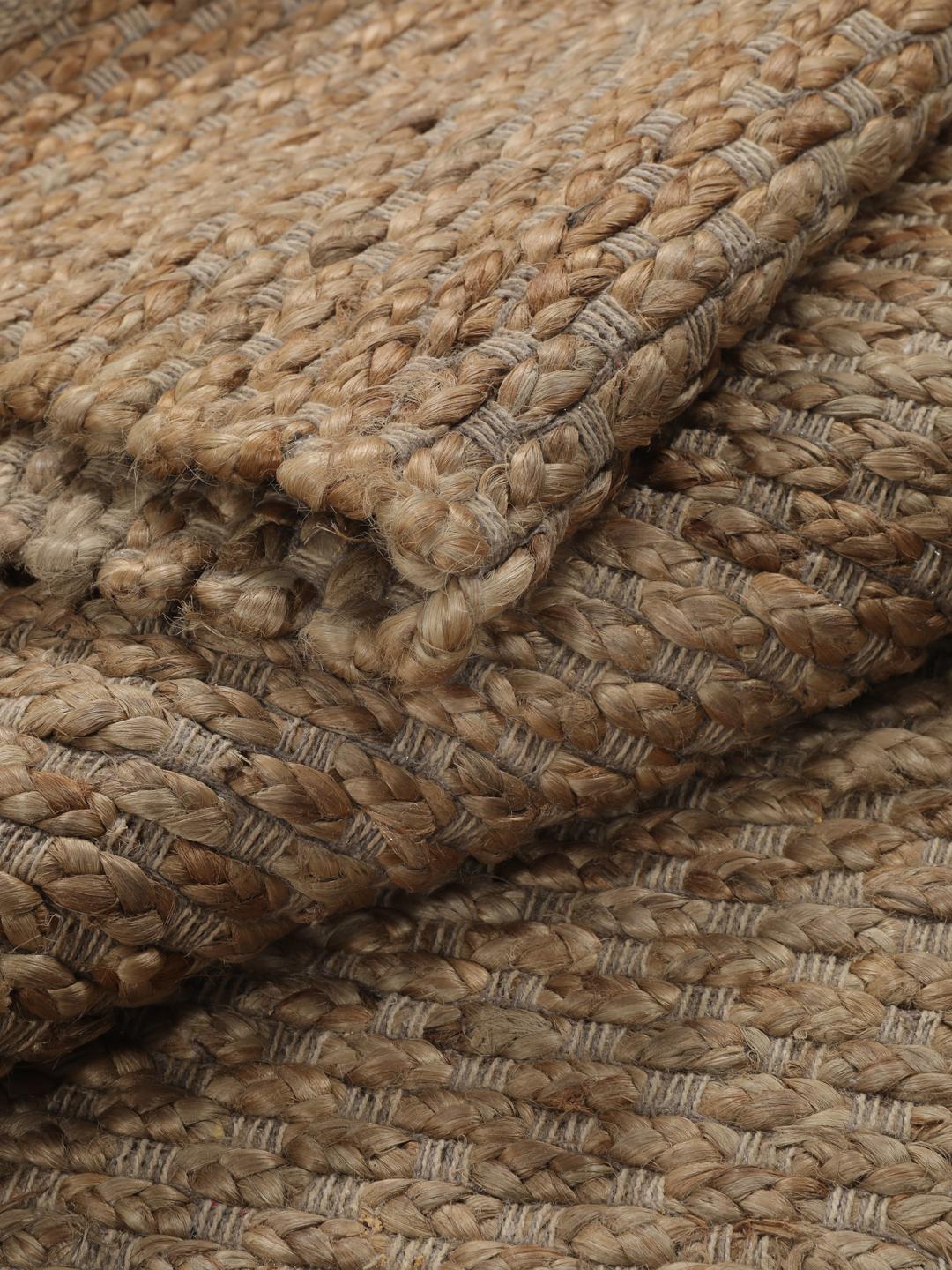 Håndvevd juteteppe fra India i en naturlig beige farge