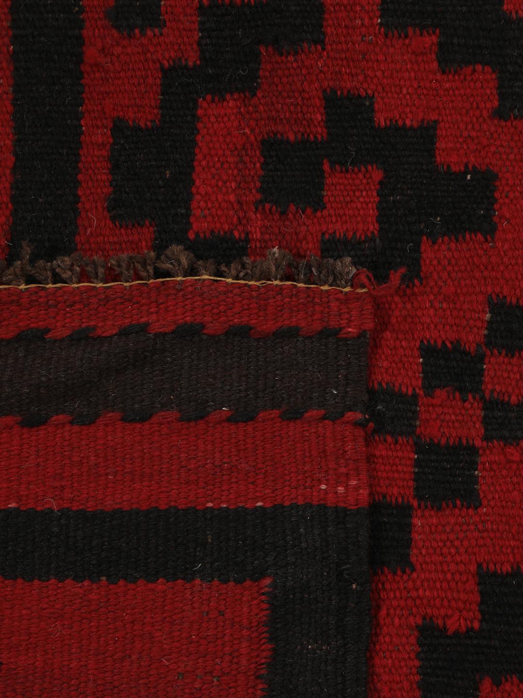 Chemin de table afghan tissé à la main avec des motifs géométriques rouges et noirs