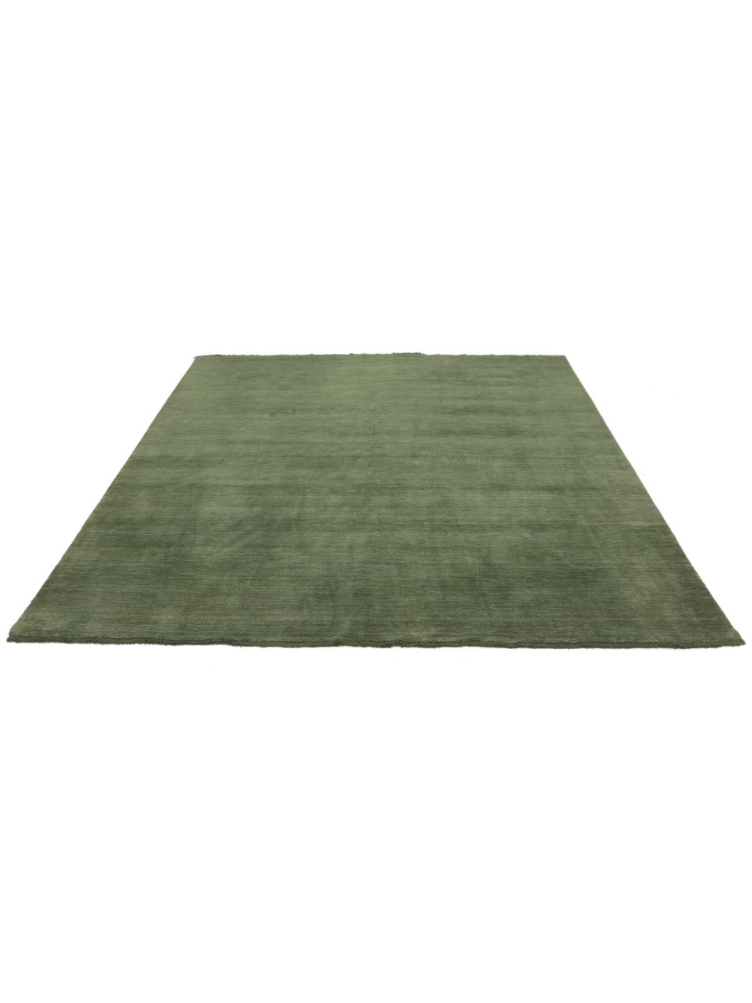 Groen handgeweven poolkleed met korte franjes