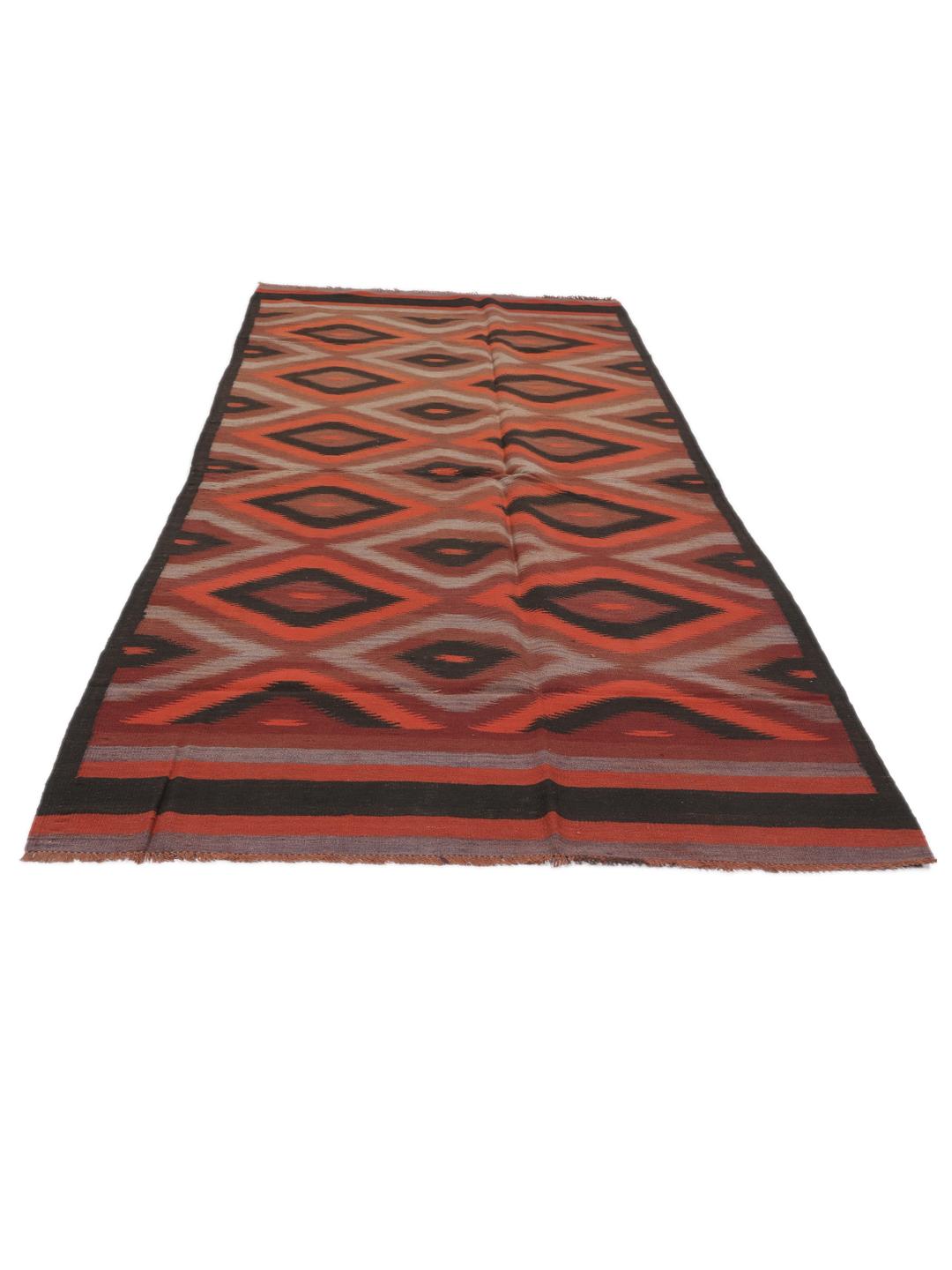 Chemin de table Kelim afghan tissé à la main avec des motifs géométriques en losanges rouges, bruns et noirs