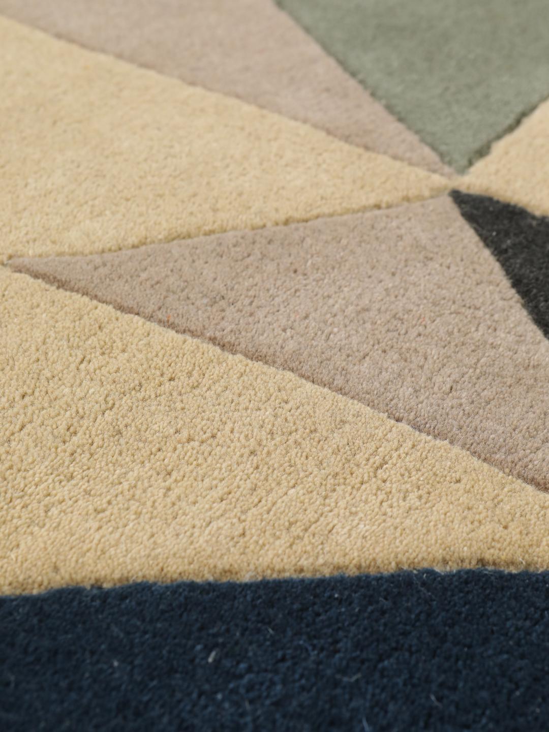 Handgetuft blauw wollen tapijt met een geometrisch patroon