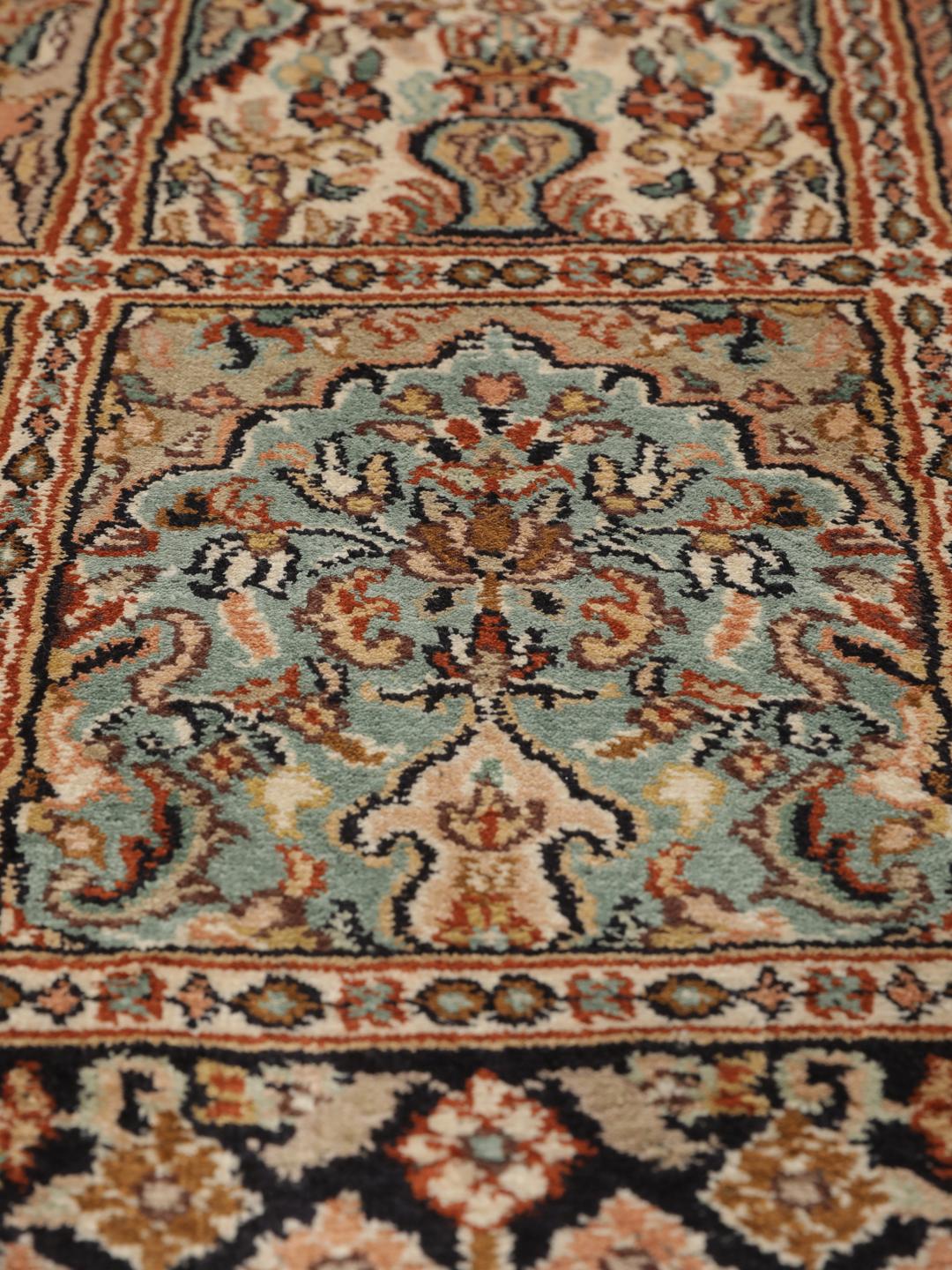 Hand-knotted Indian silk runner with intricate garden panels in multicolor
