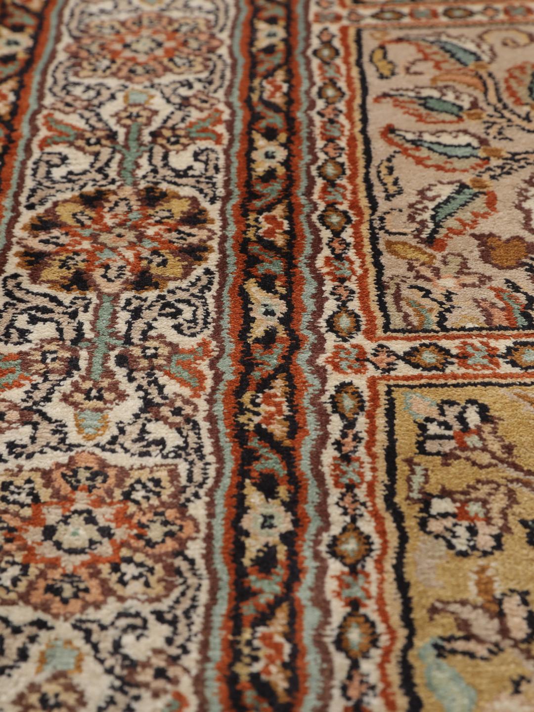 Hand-knotted Indian silk runner with intricate garden panels in multicolor