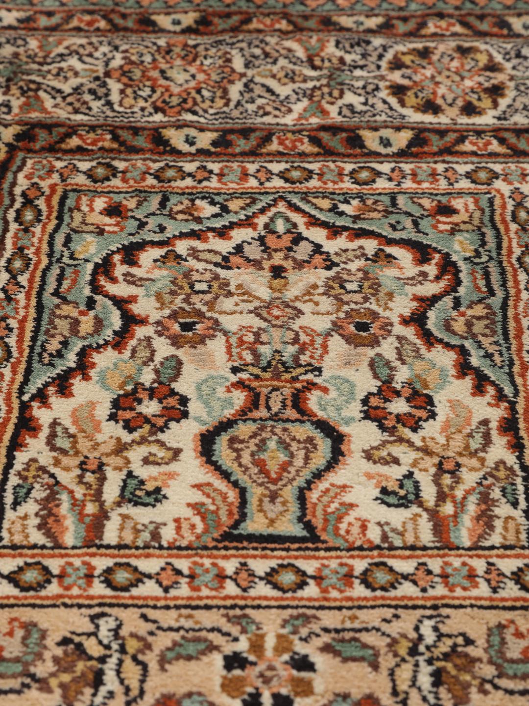 Hand-knotted Indian silk runner with intricate garden panels in multicolor